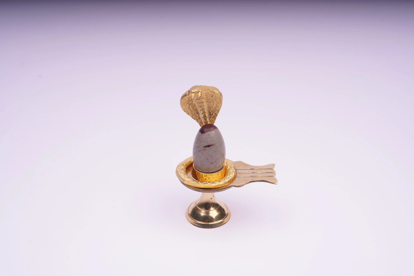 Natural Narmadeshwara Shivling oval river stone close-up