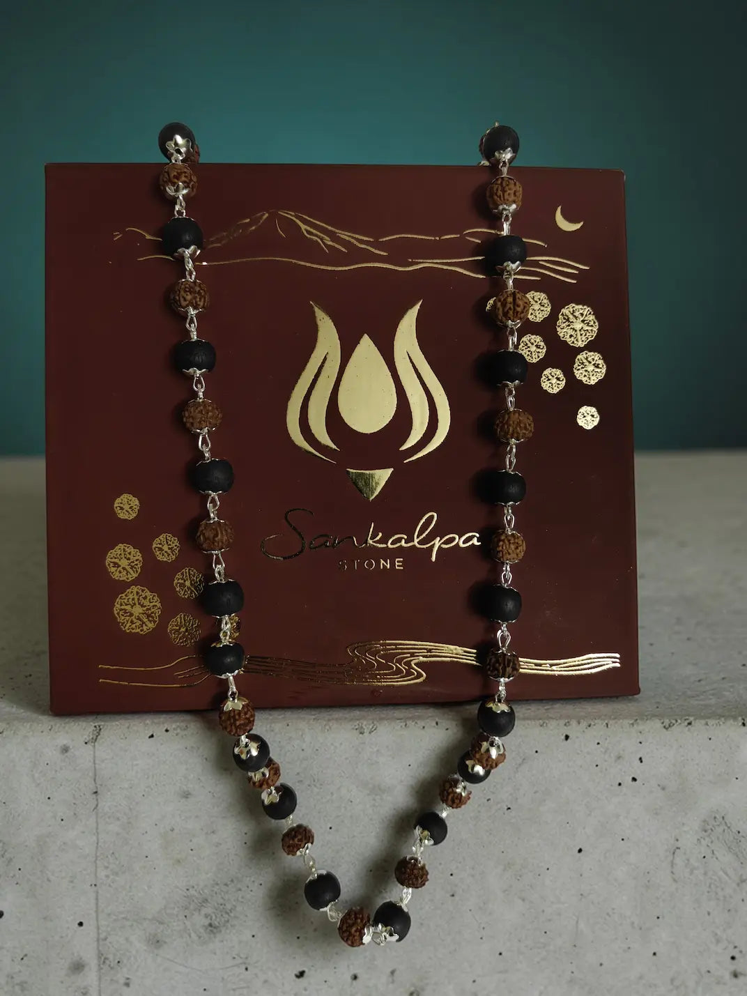 Rudraksha and Karungali mala in Sankalpa Stone keepsake box